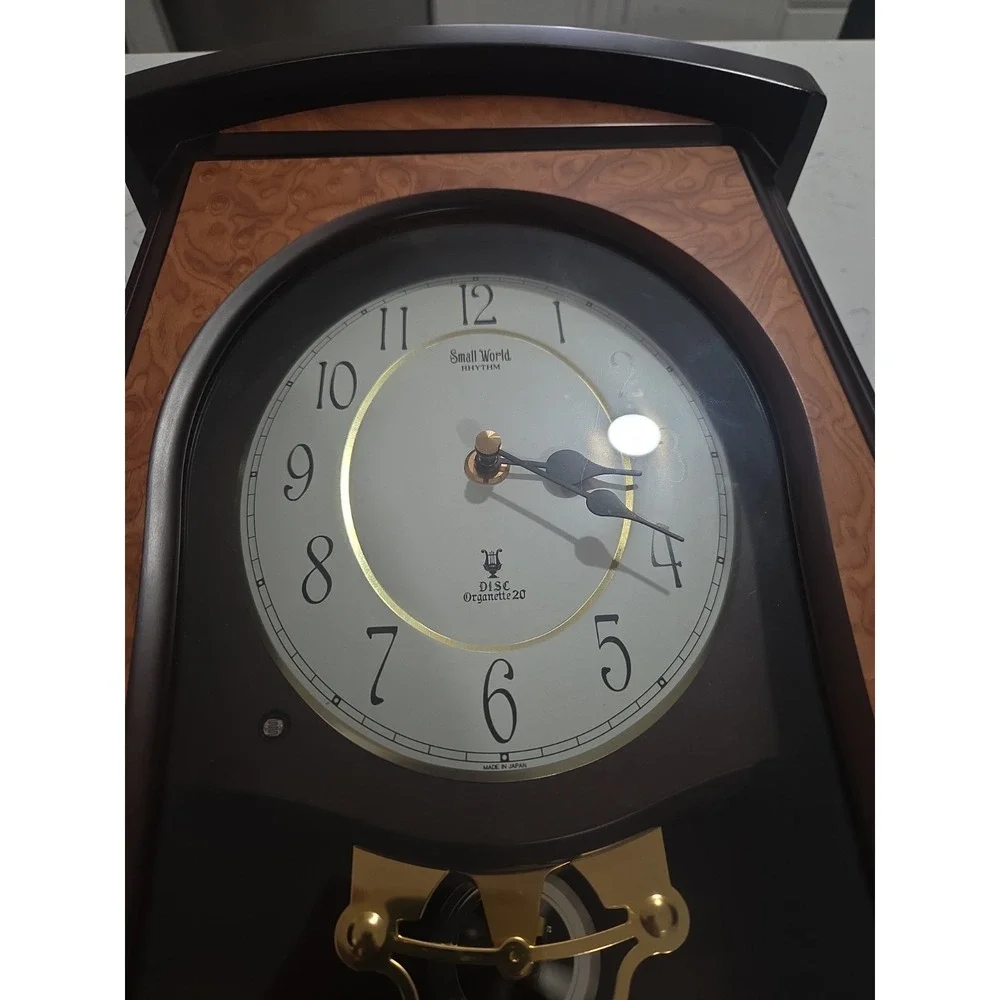 Rhythm Small World Disc Organette 20 Wall Clock